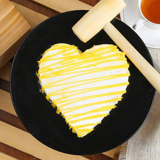 Top View of Heart Shaped Pineapple Pinata Cake