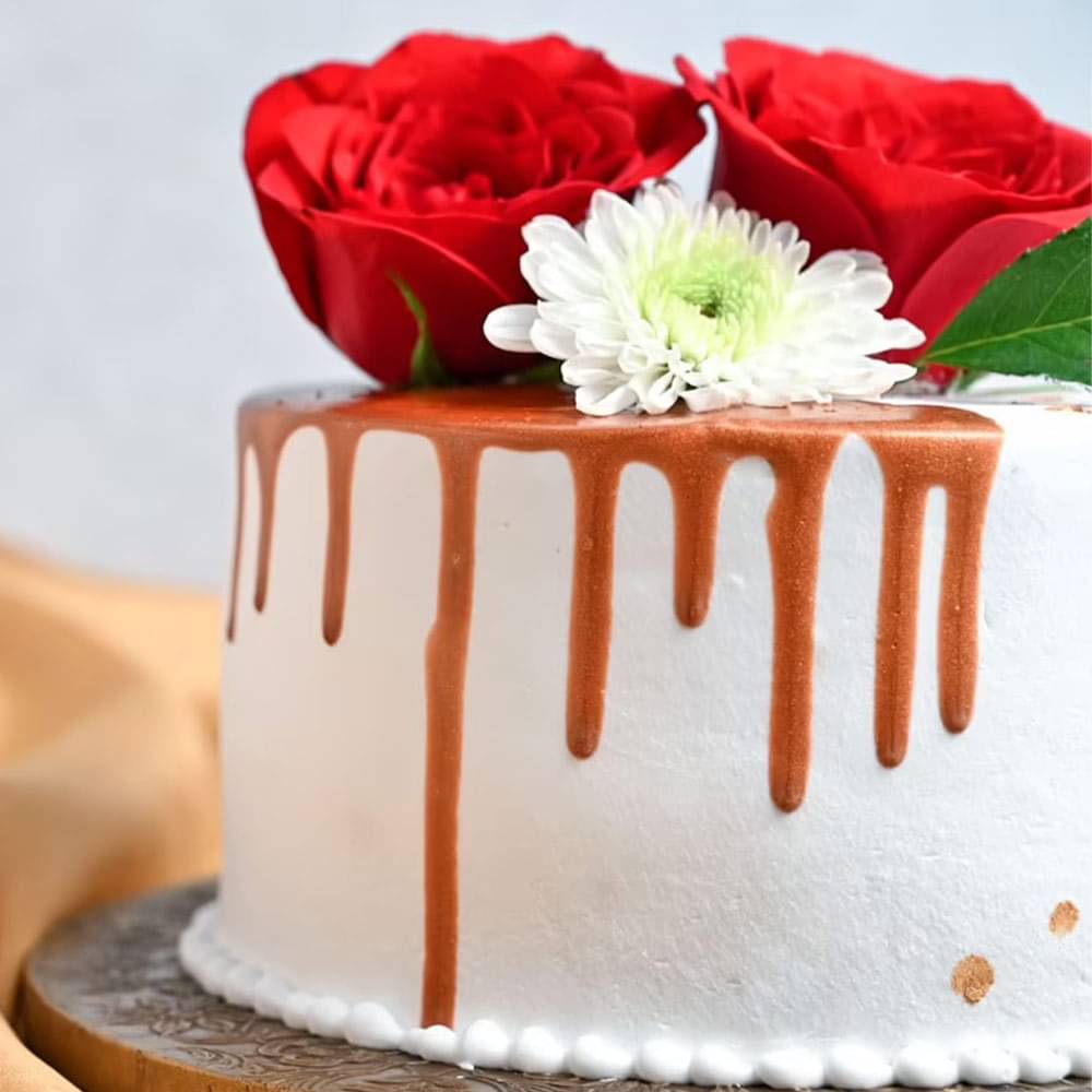 Side View Round Drooling Vanilla Rose Cake