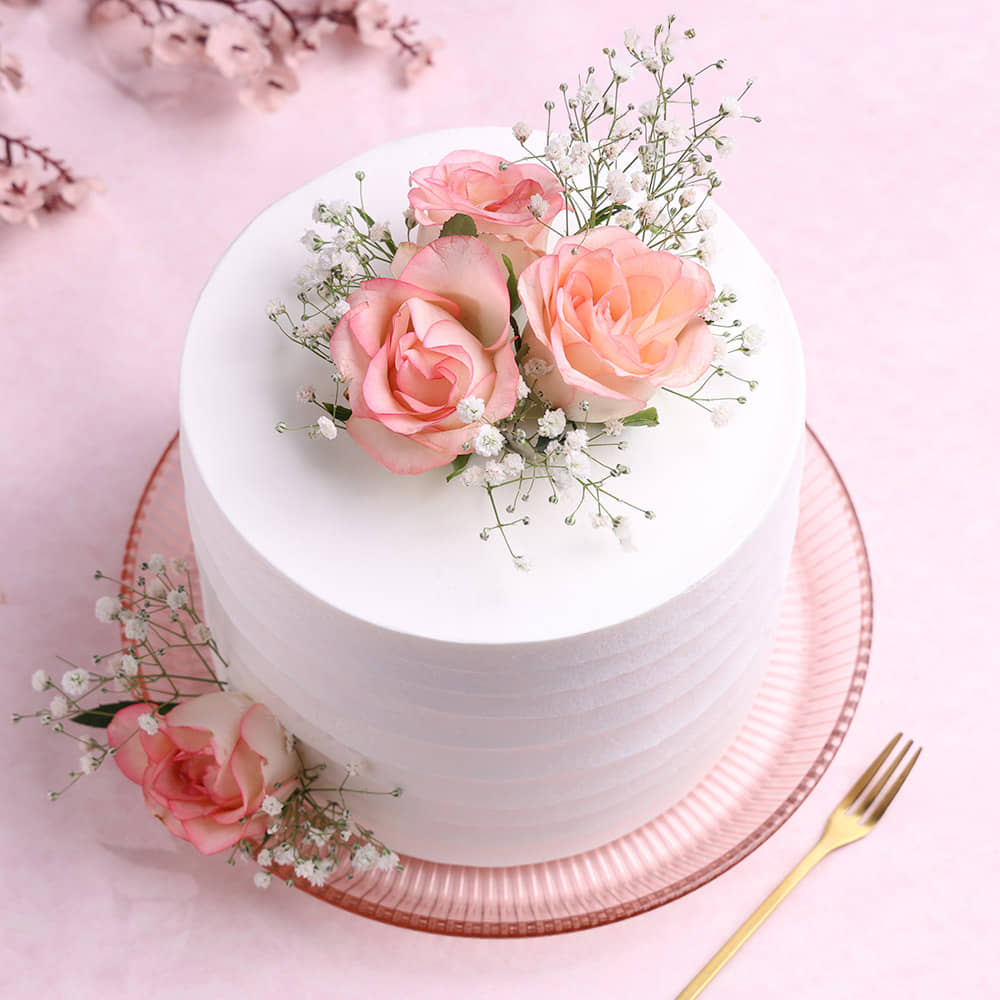 Roses Topped Vanilla Cream Cake Front View of Creamy Vanilla Rose Cake
