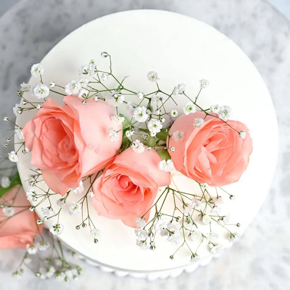 Front View of Creamy Vanilla Rose Cake 