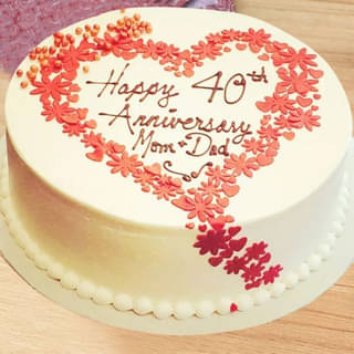 Round Shaped Anniversary Cake- Floral Anniversary Delicacy
