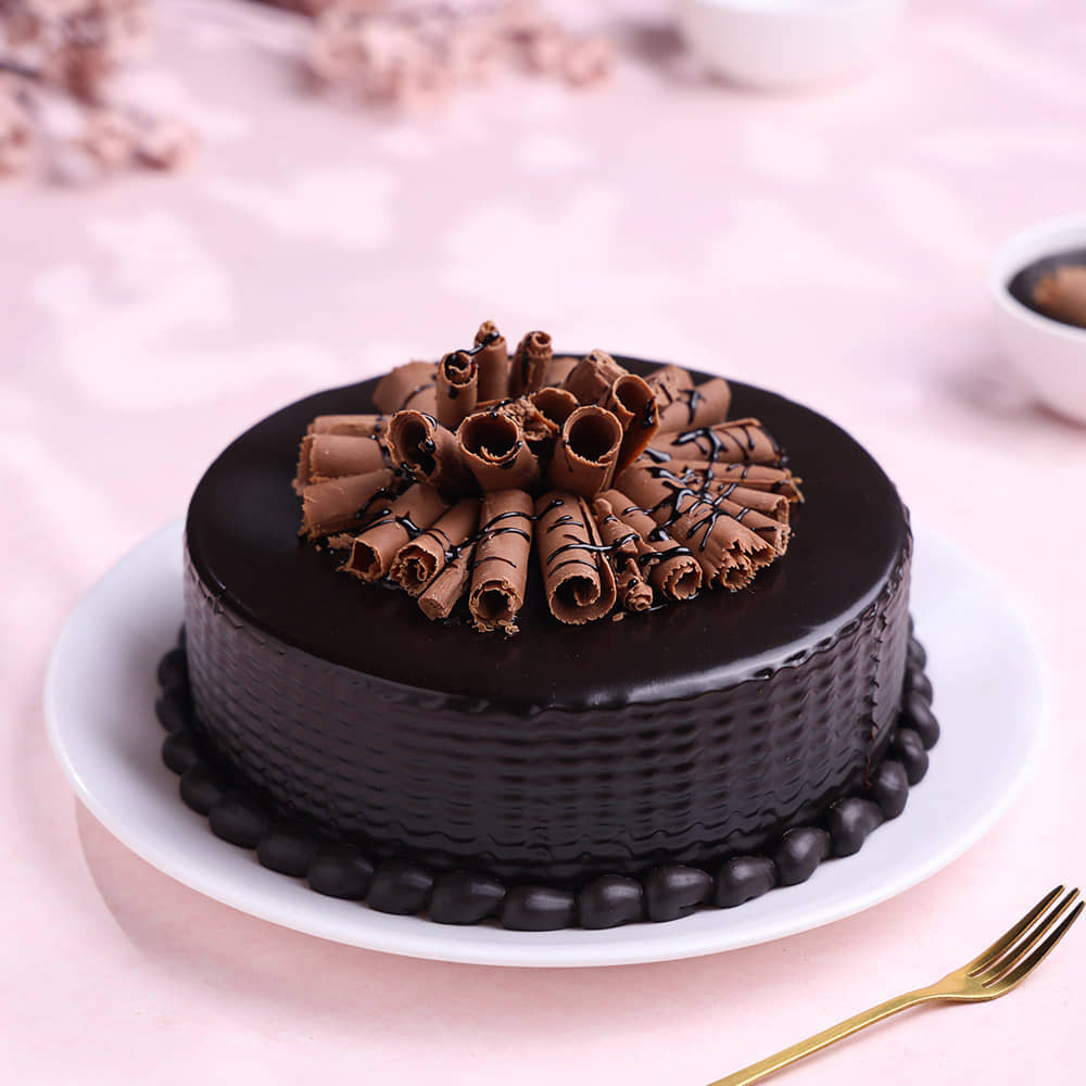 Roll Up Chocolate Truffle Cake Front View of Chocolate Cake with Swirling Design
