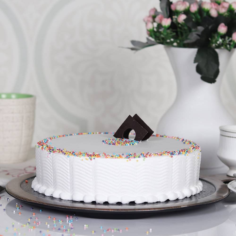 Side View of Sprinkled Adventure - A Vanilla Cake