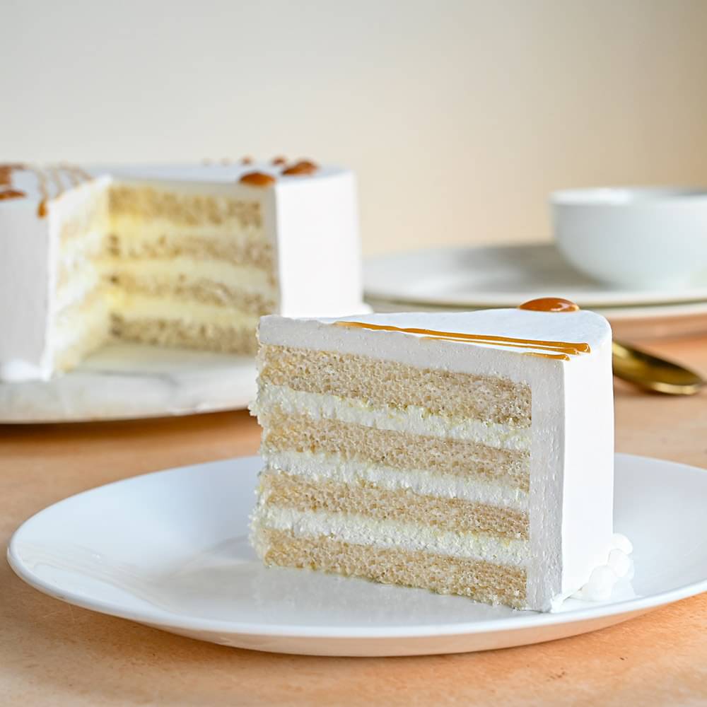 Sliced View of Round Vanilla Caramel Cake Online