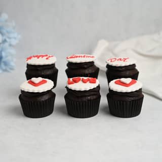 Side View of Set of Six Valentine Love Filled Chocolate Cupcakes