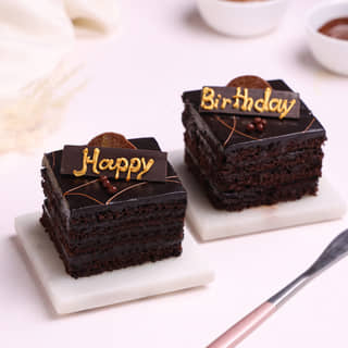 Top View of Set of Two Happy Birthday Pastry