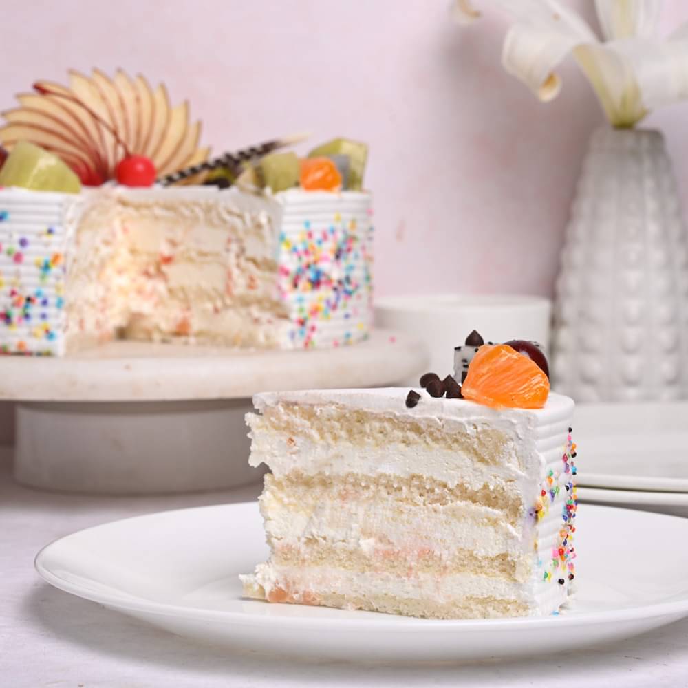 Sliced View of Fruits & Sprinkles Vanilla Cake