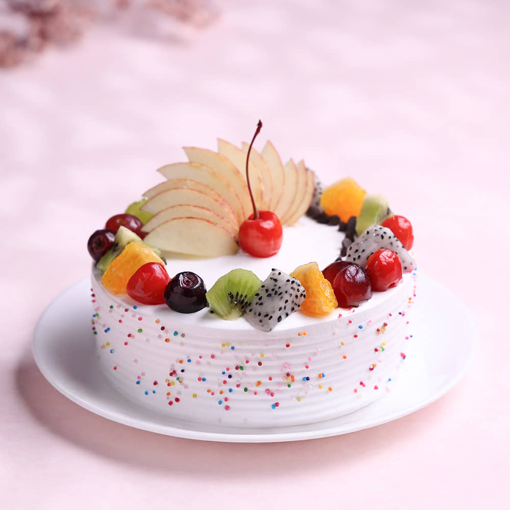 Side View of Fruits & Sprinkles Vanilla Cake