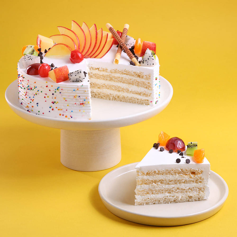 Sliced View of Fruits & Sprinkles Vanilla Cake