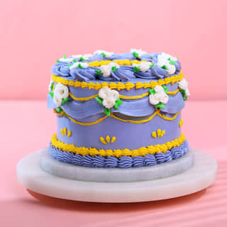 Side View of Sundrop Flower Rapunzel Cake Side View of Sundrop Flower Rapunzel Cake