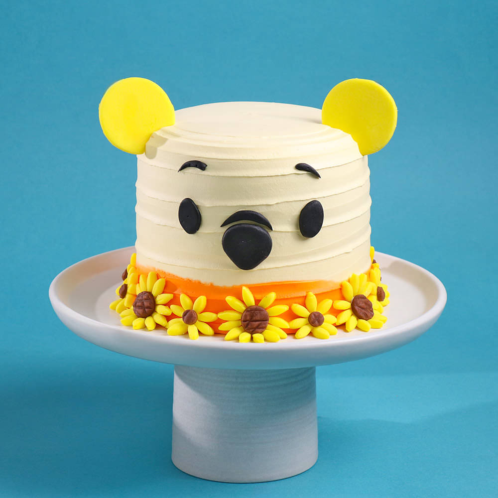 Side View of Sunny Blooms Pooh Cake