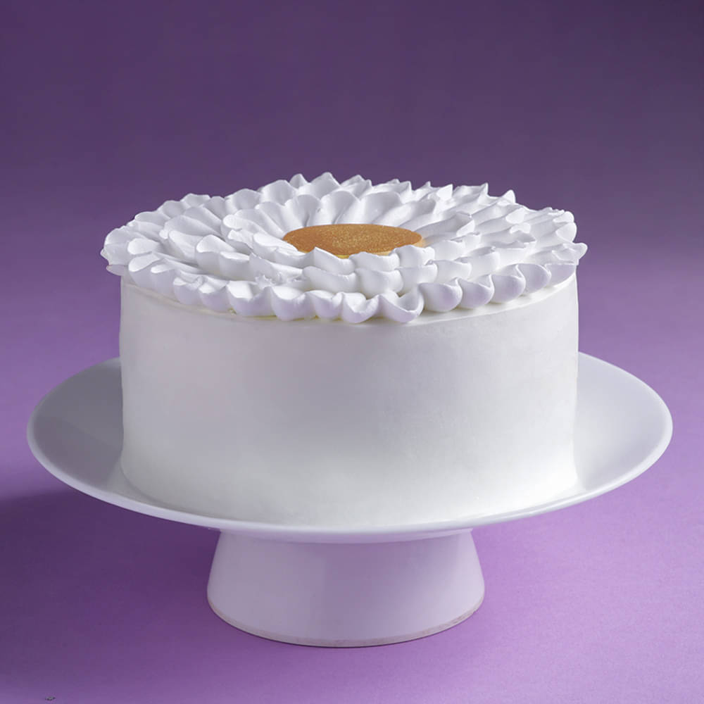 Front Angled View of Sweet Petals Vanilla Cake