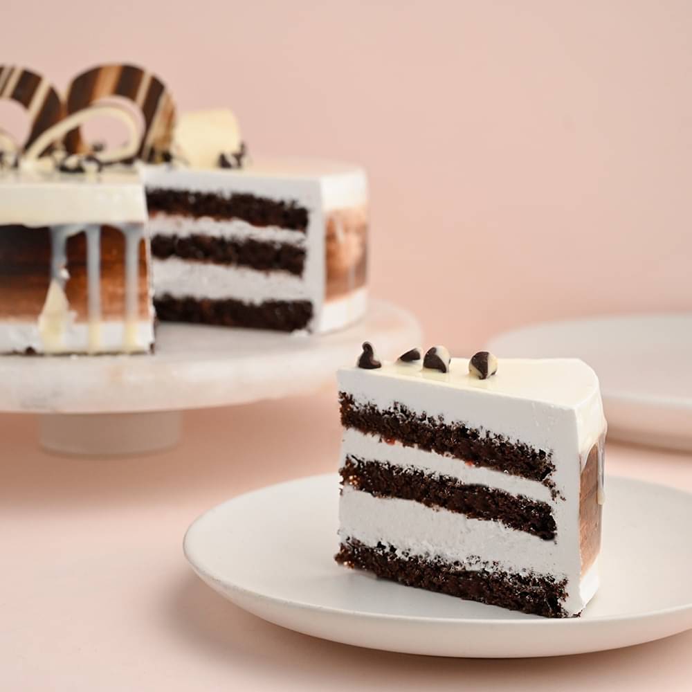 Sliced View of Round Choco Vanilla Cake