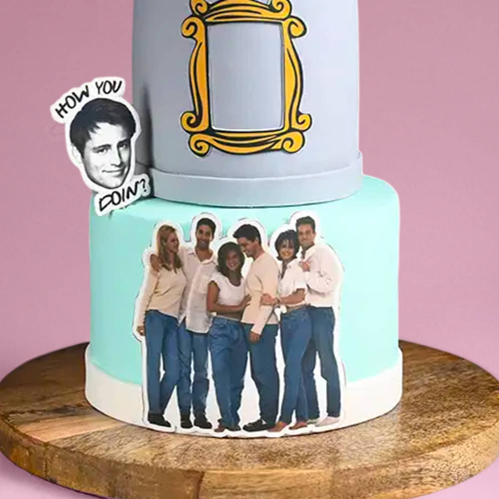 Upper Part  Zoomed-in View of Two Tier F.R.I.E.N.D.S Themed Multi Flavoured Cake