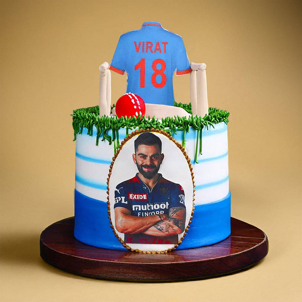 Side View of Run Machine Cricket Theme Cake