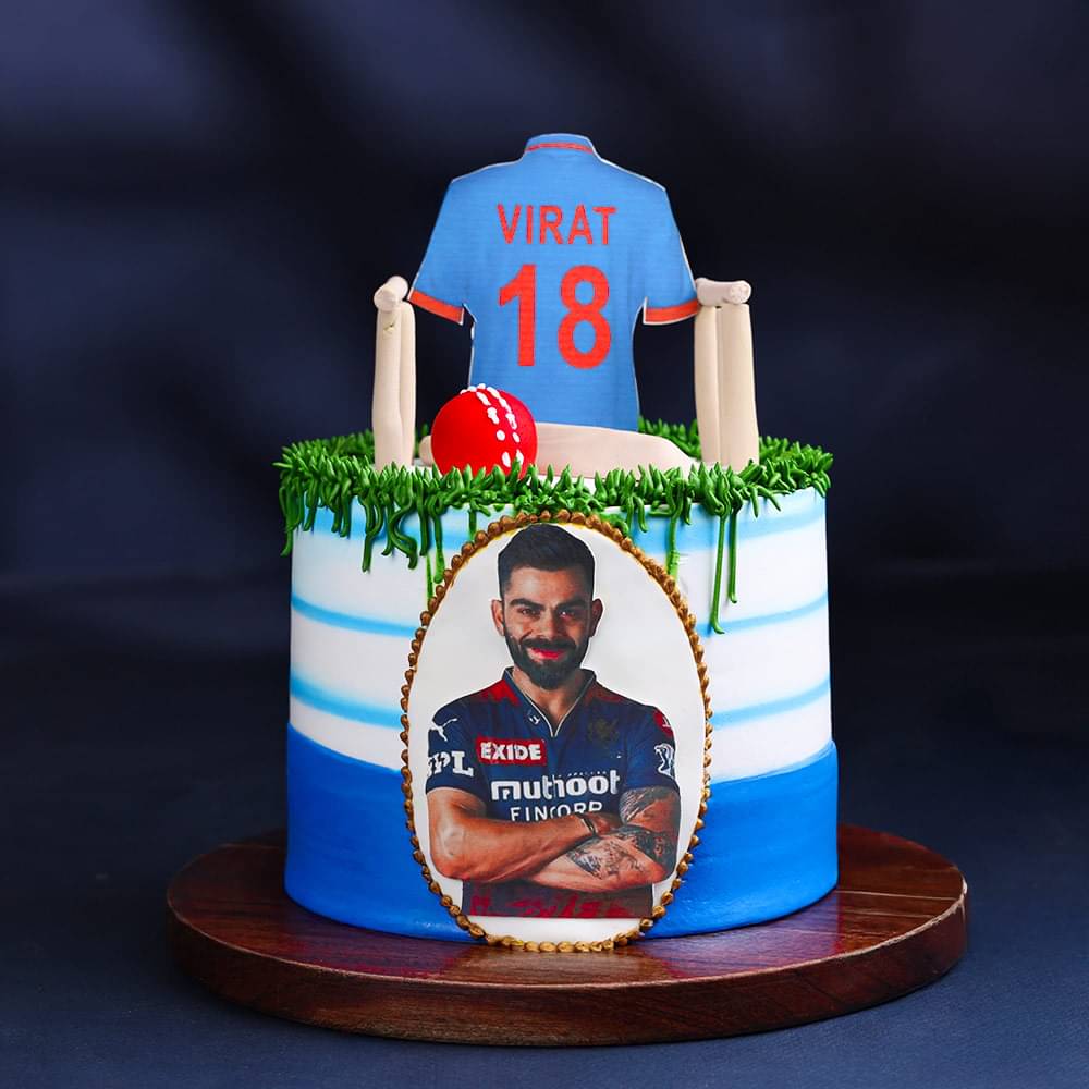 Side View of Run Machine Cricket Theme Cake