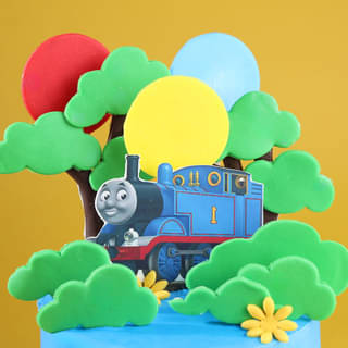 Zoomed-in View of Thomas Train Celebration Cake