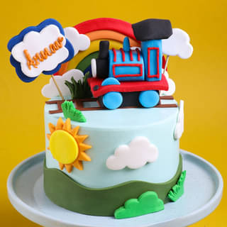 Zoomed-In View of Thomas Train Happy Ride Cake