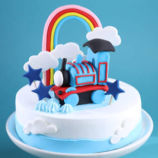 Zoomed-in View of Thomas Train Rainbow Cake
