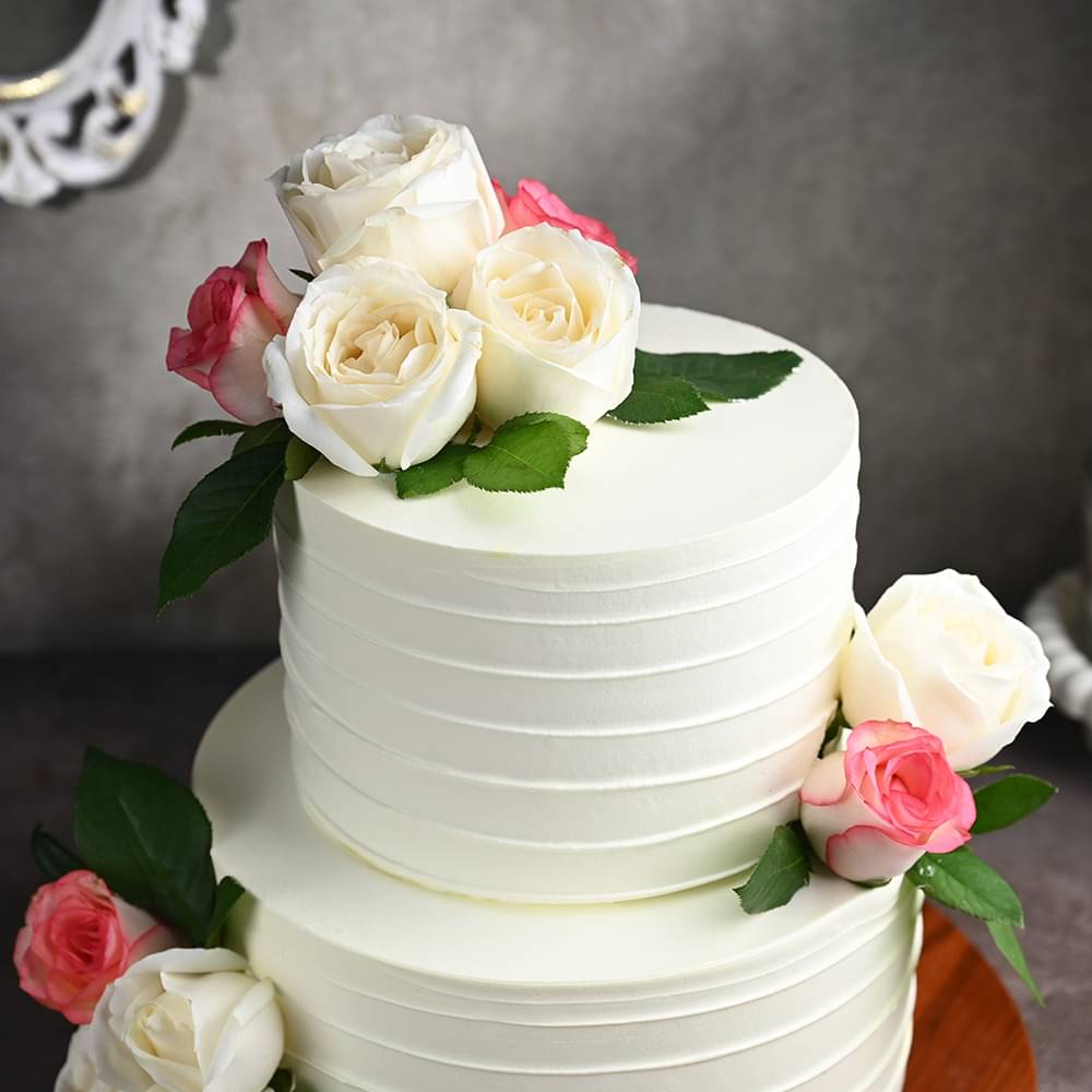 Zoomed View of Two Tier White Floral Cake