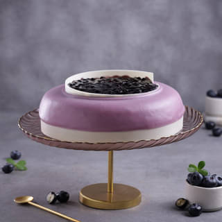 Front View of Vanilla Blueberry Cake Front View of Vanilla Blueberry Cake