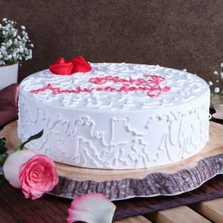 Front View of Round White Anniversary Vanilla Cake
