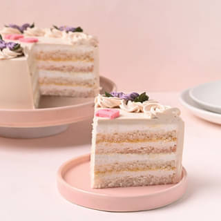 Slices of Vanilla Rosette Birthday Cake