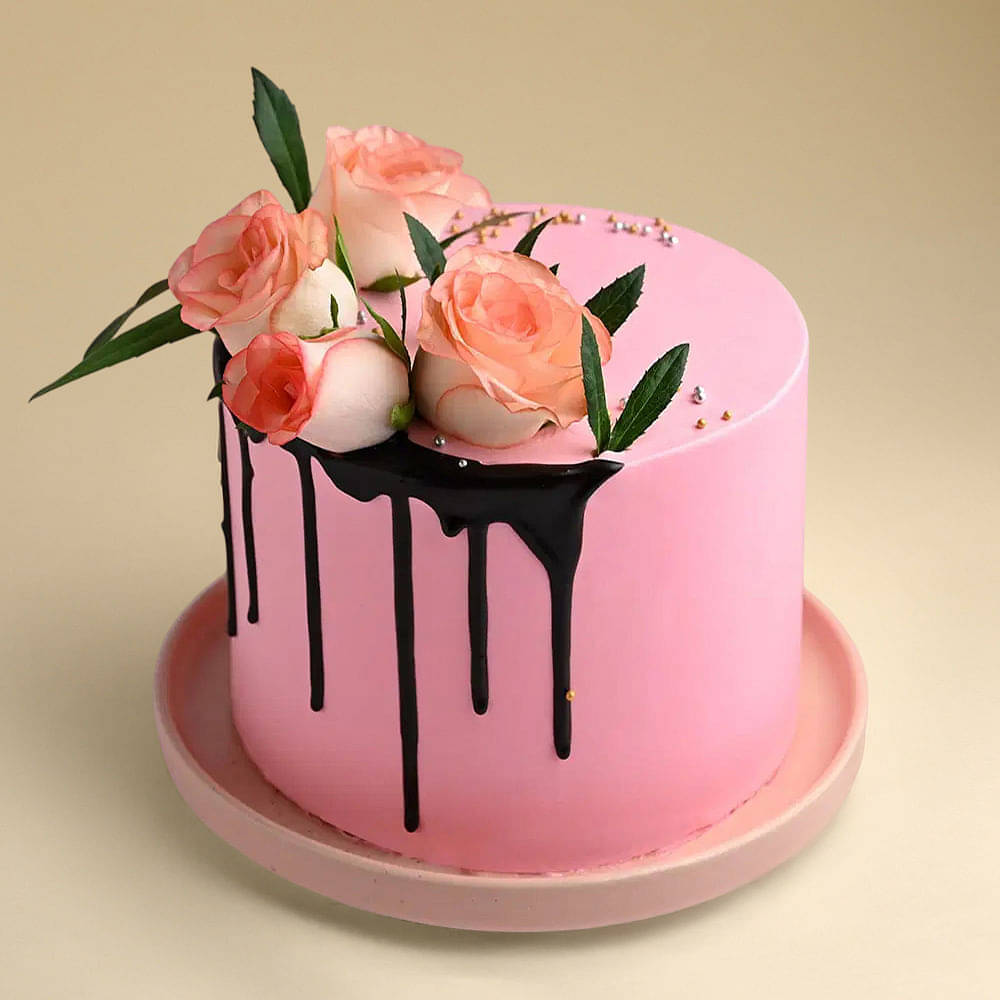 Side View of Pink Rose Cake with Romantic Rose Swirls