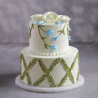 Front View of White Roses Floral Cake