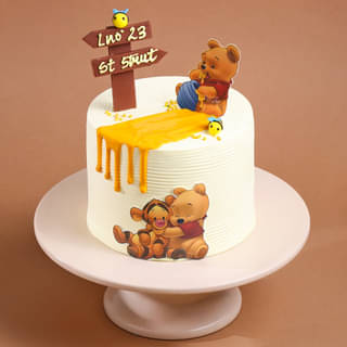 Side View of Winnie the Pooh N Tigger Cake
