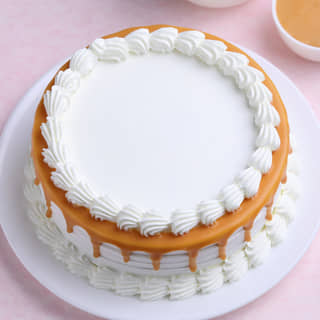 Front View of Yellow Glaze Vanilla Cake
